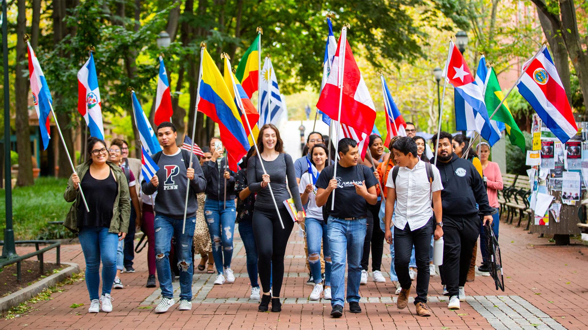 Students Carrying Flags on Locust Walk