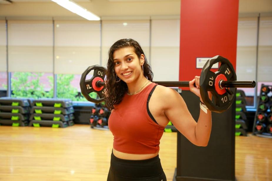 Serena Gandhi lifting weights at Pottruck Fitness Center