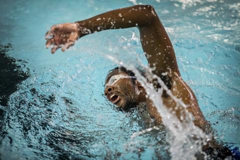 Student swimming during the Penn Triathalon