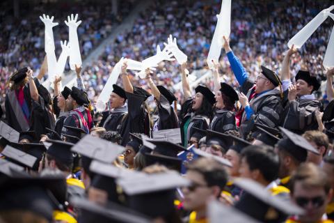 Students cheering at Commencement