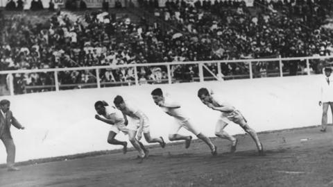 John Baxter Taylor Jr. races in the 1908 Summer Olympics in London
