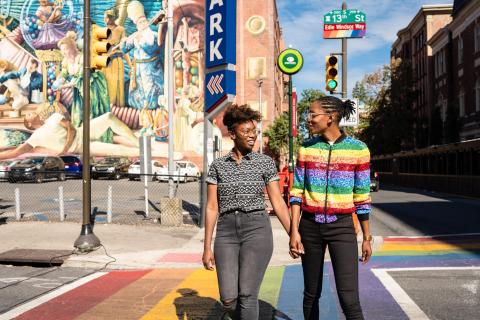 Couple walking in the gayborhood