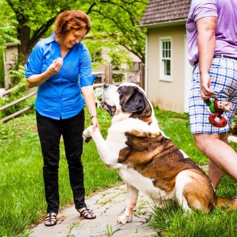 Penny Ellison with dog outside