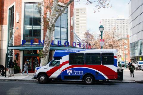 Penn transit bus in front of the Penn Bookstore