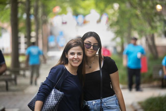 Student and parent embracing at move-in