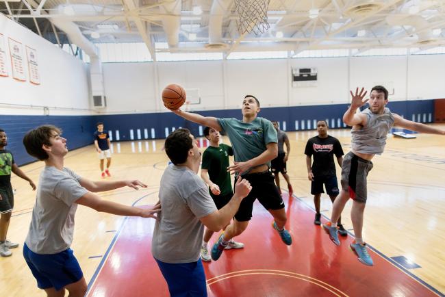 Students playing basketball