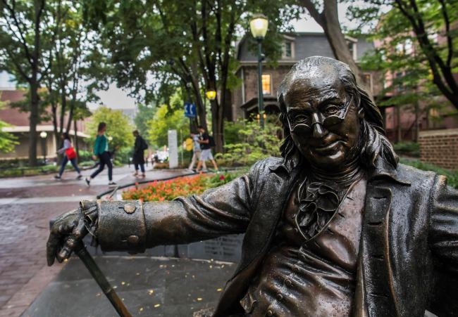 "Ben on the Bench" statue of Ben Franklin on campus
