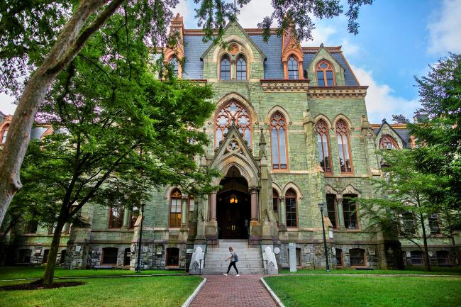 Student in front of College Hall