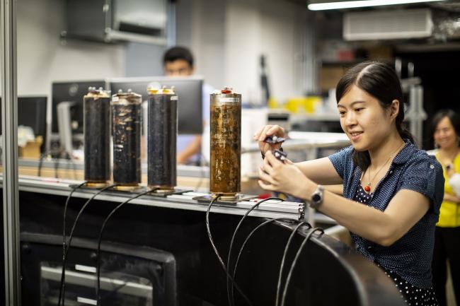 Student working with equipment in robotics lab