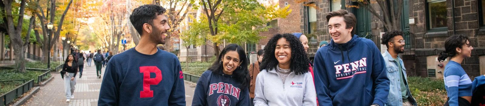 Group of students walking on Locust Walk