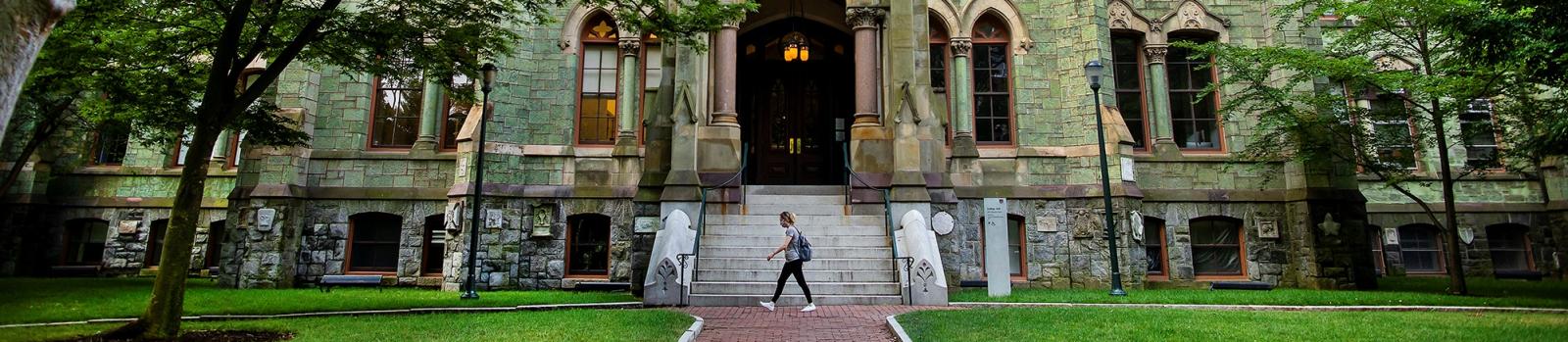 Student in front of College Hall