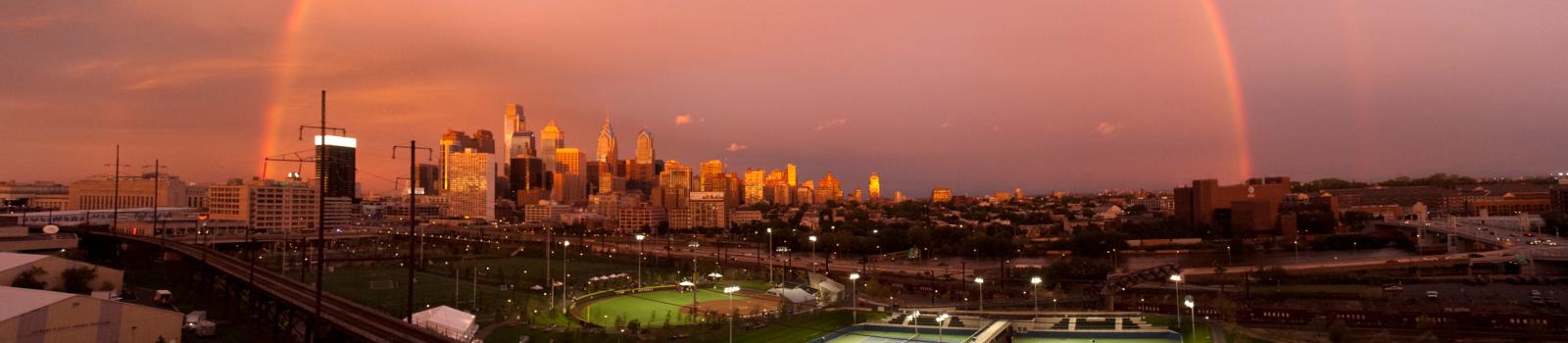 Philadelphia skyline with rainbow